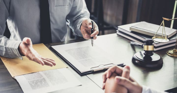lawyer talking to client